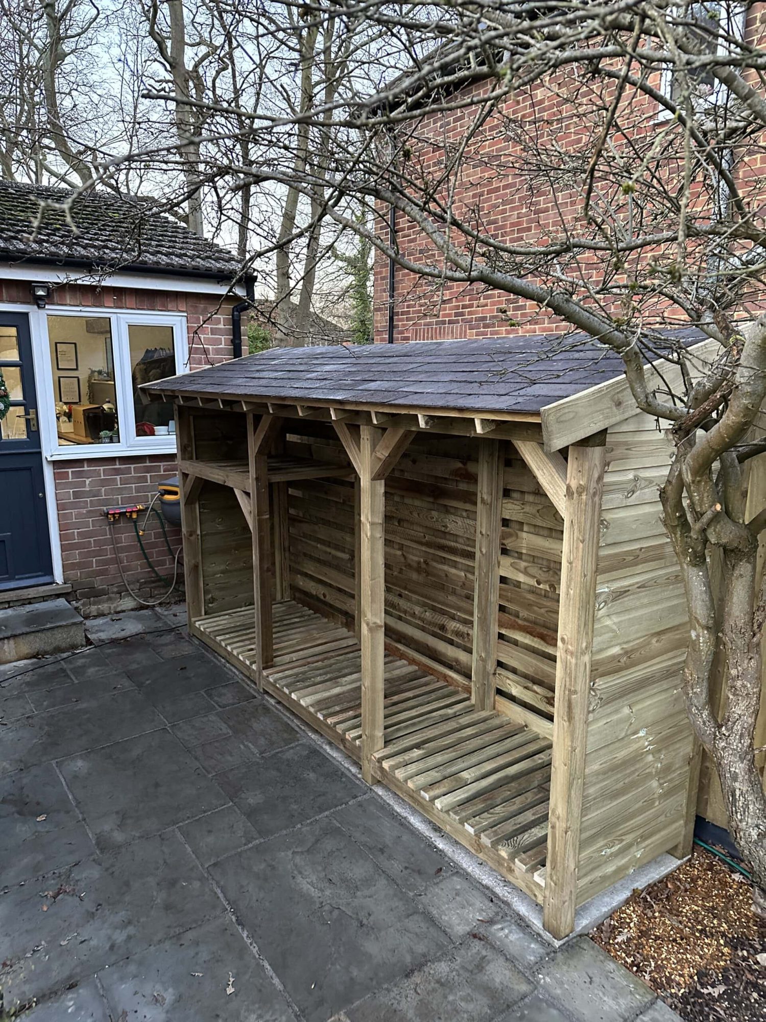 Frank - Slate Roof Log Store