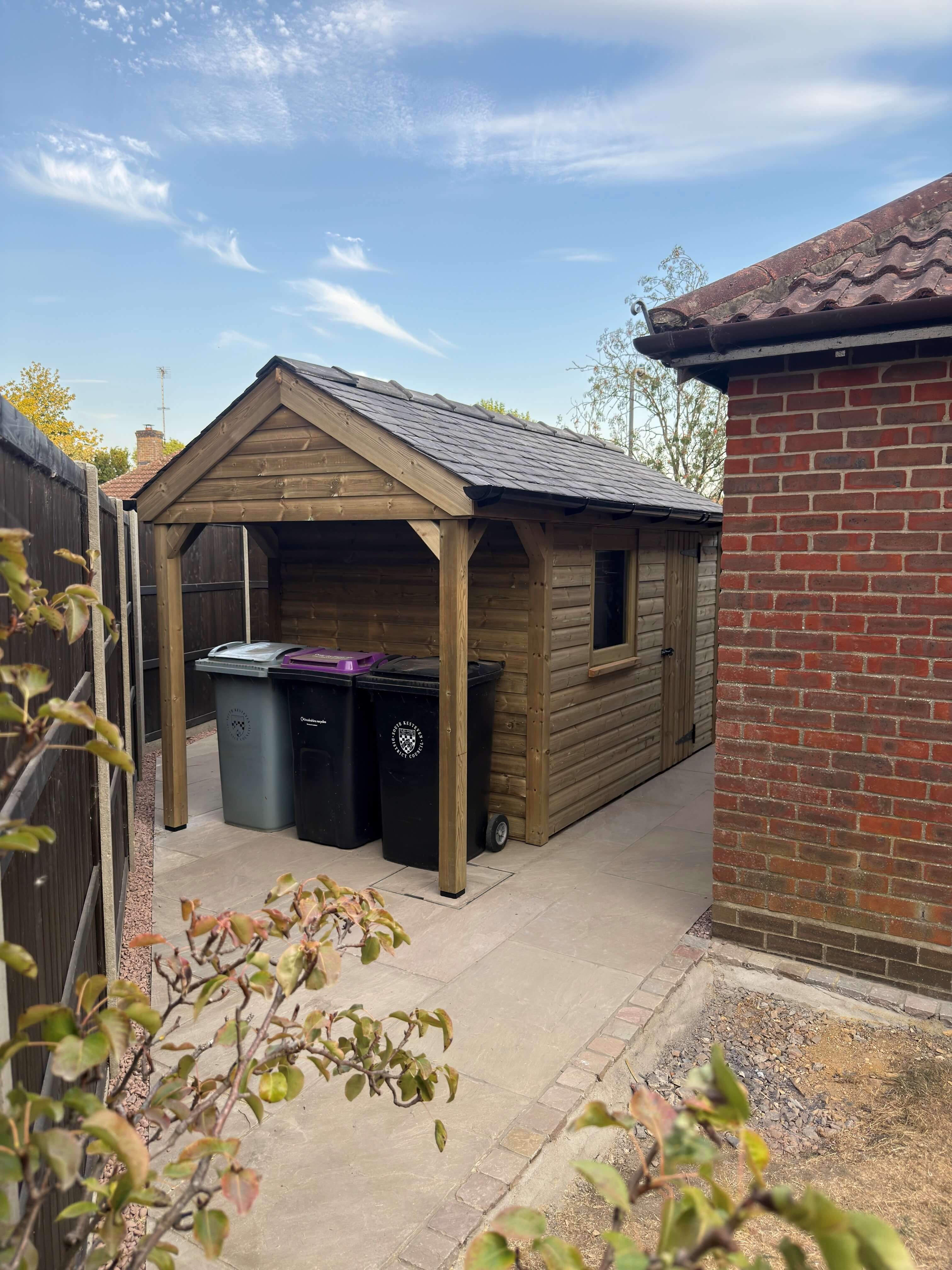 Permitted Development Shed with covered wheelie bin storage and reclaimed Welsh slate roof