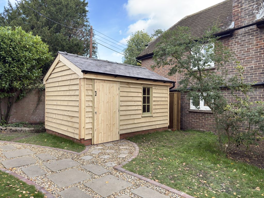 Weatherboard Workshop Shed with reclaimed Welsh slate roof and traditional featherboard cladding